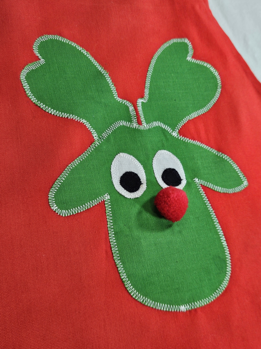 Festive Green Reindeer Appliqué Kitchen Bib Apron with Red Pom Accent